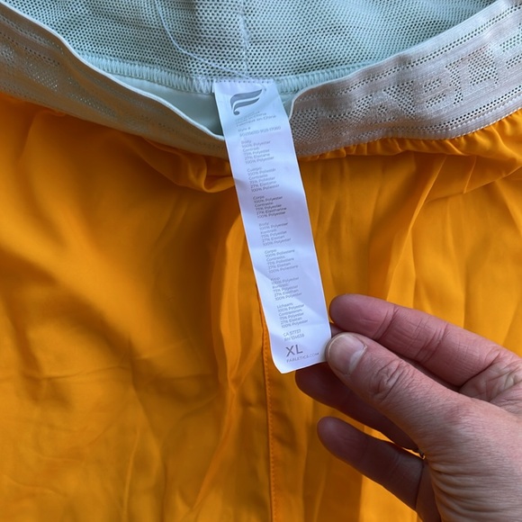 NWT women’s XL Fabletics 5” perforated run shorts - built in compression shorts. - Picture 2 of 4